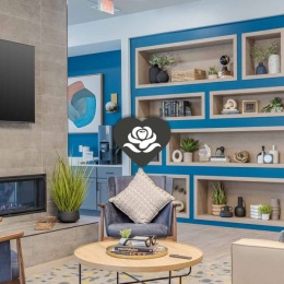 Let your love for our Rochester community bloom with the help of our elegantly designed common spaces. Experience love at first sight for yourself by booking a tour today. community area with seating and a fireplace
